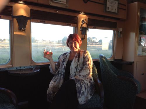 Fiona enjoying bubbles in the lounge car